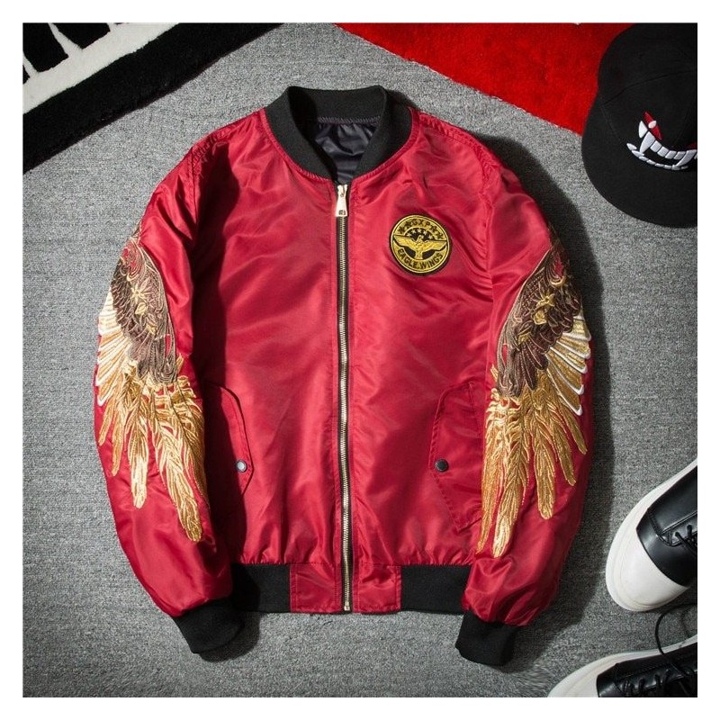 Black bomber jacket with embroidered golden wingsJackets