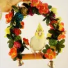 AvesWooden bird swing - with flowers / bells decoration