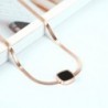 CollarRose gold snake chain necklace - with black charm