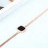 CollarRose gold snake chain necklace - with black charm