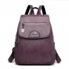 MochilasLeather backpack - with hand strap / front zipper