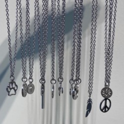 CollaresStainless steel necklaces - sun / compass/ paw / yin yang