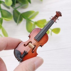 DecoraciónMini wooden violin - musical instrument - decoration