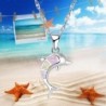 CollarSilver necklace with a colorful opal dolphin