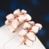 Flower shaped stud earrings - with multicolor zircon - rose gold