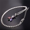 CollarElegante collar con peces de cristal de colores