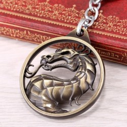Round metal keychain with dragonKeyrings
