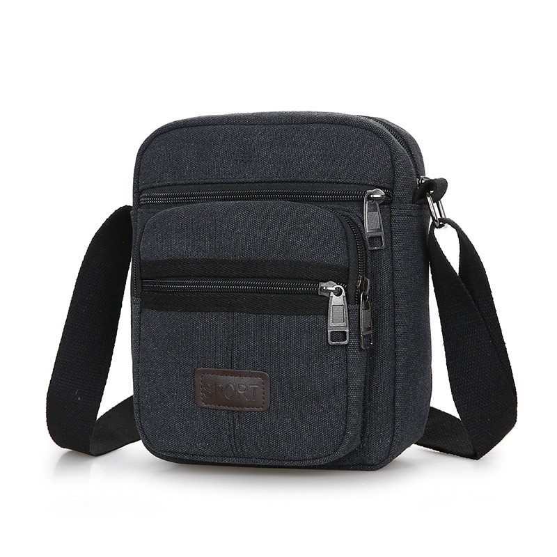 Stylish canvas shoulder bag - with zippersBags