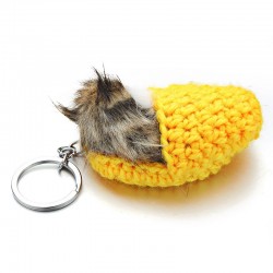 Sleeping cat in a hand-woven cot - keychainKeyrings