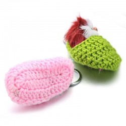 Sleeping cat in a hand-woven cot - keychainKeyrings