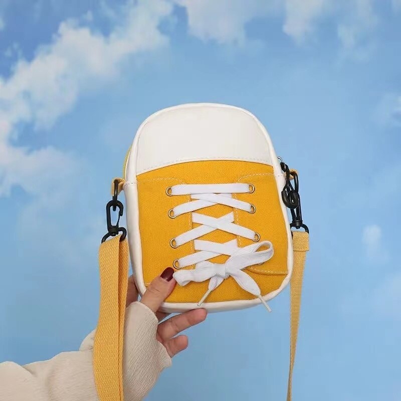 BolsasBolso bandolera pequeño de lona - forma de zapato
