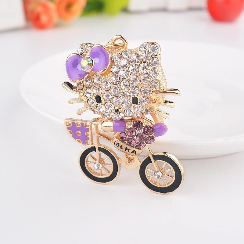 Crystal kitten on a bicycle - keychainKeyrings
