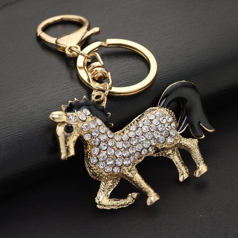 llaveroCaballo de cristal dorado - llavero