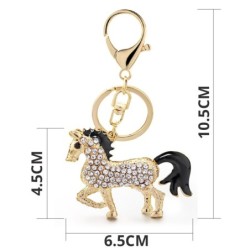 llaveroCaballo de cristal dorado - llavero