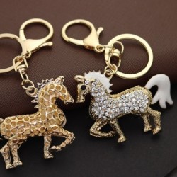 llaveroCaballo de cristal dorado - llavero