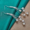 Long silver earrings - chains with beadsEarrings