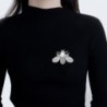 Bee shaped silver brooch - with a pearlBrooches