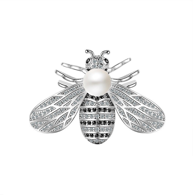 Bee shaped silver brooch - with a pearlBrooches