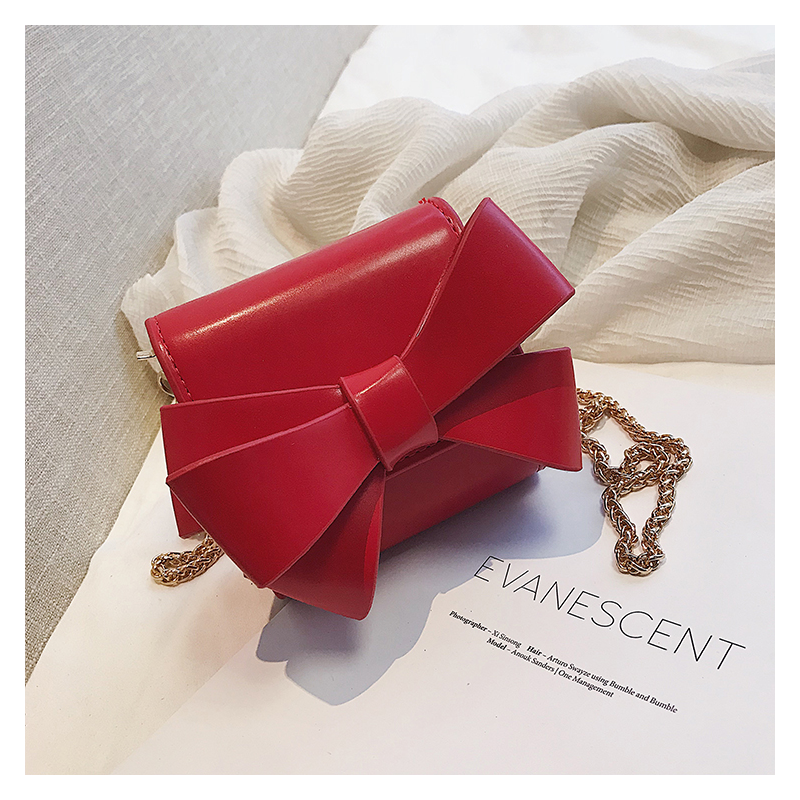 BolsasBolso pequeño y elegante con cadena de arco