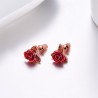 AretesPendientes de oro con rosa roja