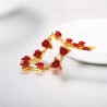 Gold & silver bracelet with red rosesBracelets