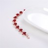 Gold & silver bracelet with red rosesBracelets