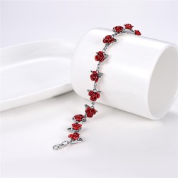 Gold & silver bracelet with red rosesBracelets